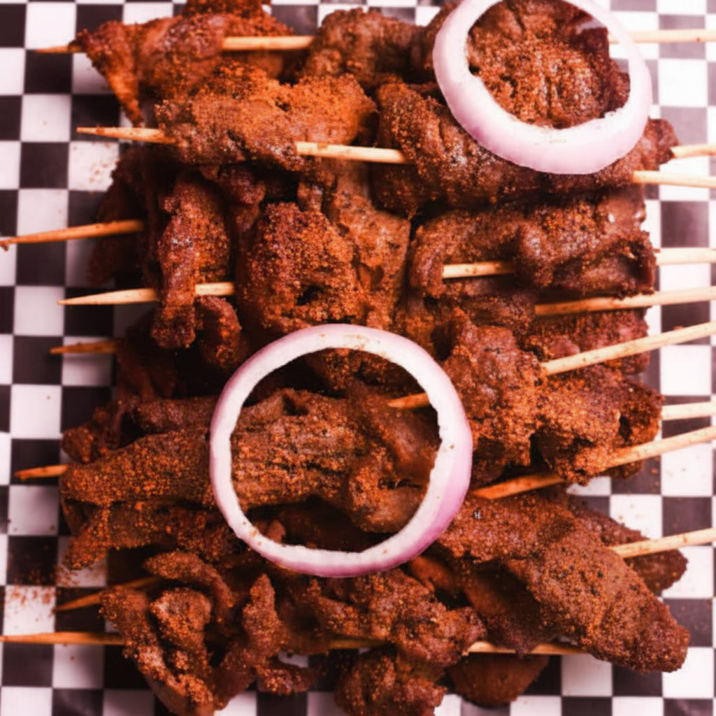 Spicy dry Beef Suya bowl with onions