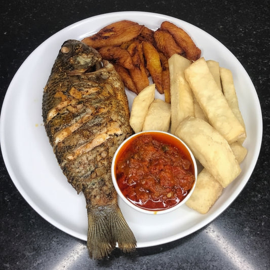 Big Tillpia With Yam Plaintain & Sauce